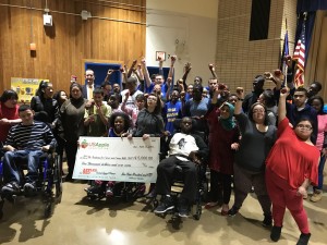 811X students receive big check from Apples4Ed
